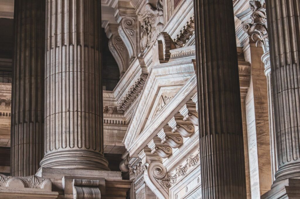 Intricate neoclassical architecture with prominent columns and ornate details.